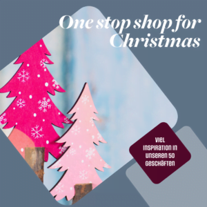 Visual met twee roze kerstbomen. Tekst: One stop for Christmas - genoeg inspiratie in onze 50 winkels