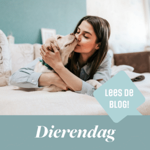 Een vrouw die haar huisdier knuffelt op dierendag