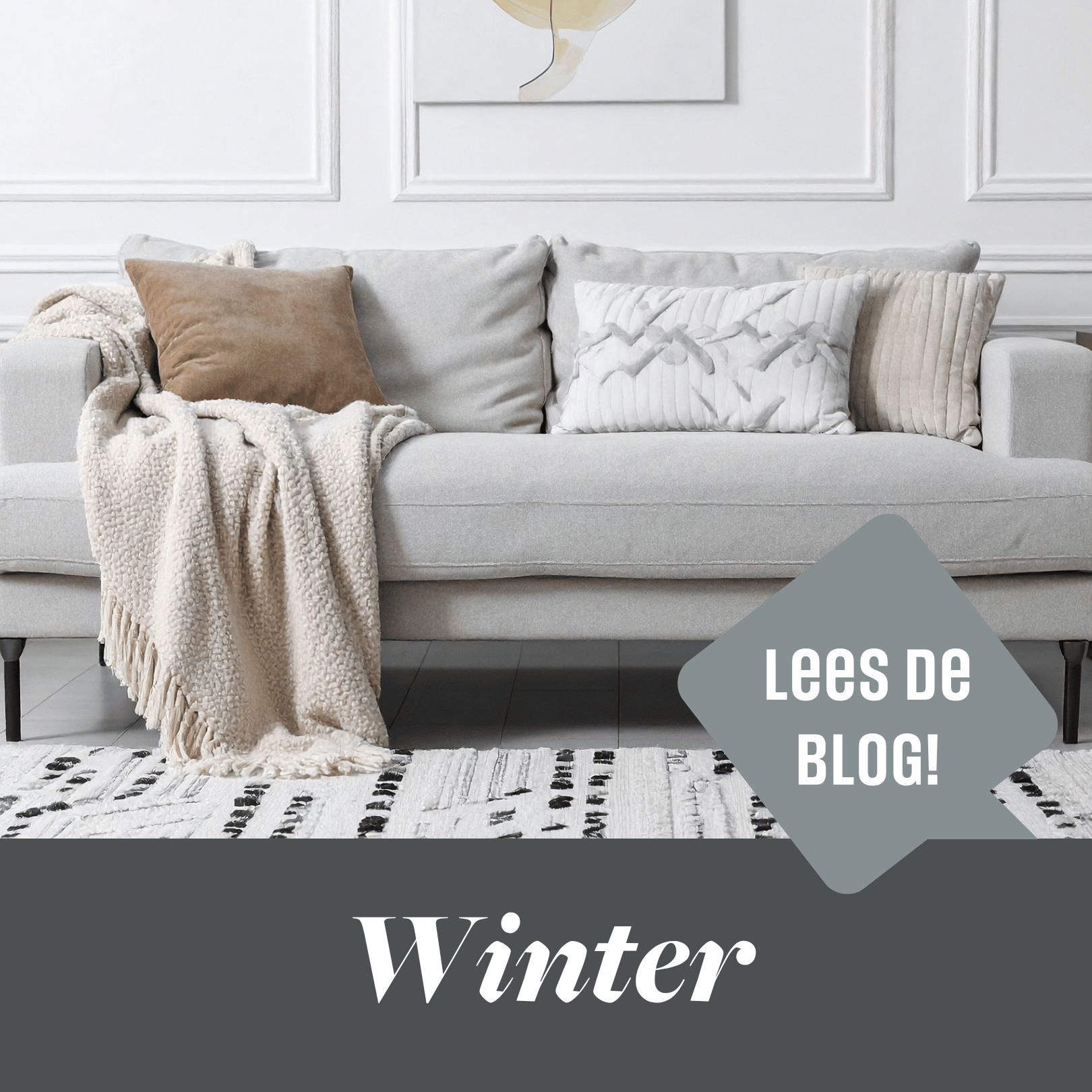 Omslagfoto winterproof huis | Woonboulevard Heerlen. Een grijze bank bekleed met warme kussens en een dikke deken