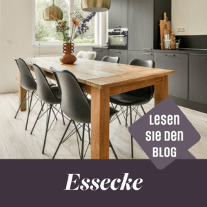 Der Essbereich Ihres Wohnzimmers! Hier sehen wir einen Holztisch mit modernen schwarzen Stühlen in einer offenen Küche neben dem Fenster. Das schafft eine angenehme, lebendige Atmosphäre.